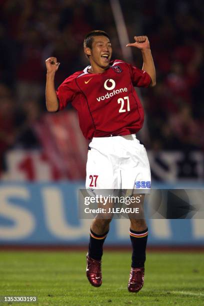 Takuya Yokoyama of Urawa Red Diamonds celebrates scoring his side's seventh goal during the J.League J1 match between Urawa Red Diamonds and Kashiwa...