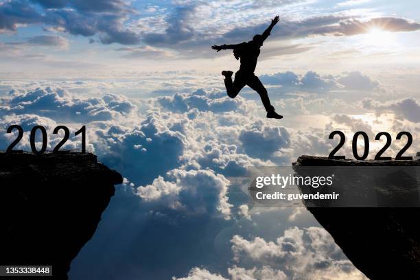 jump from year 2021 to 2022 - start new business stock pictures, royalty-free photos & images