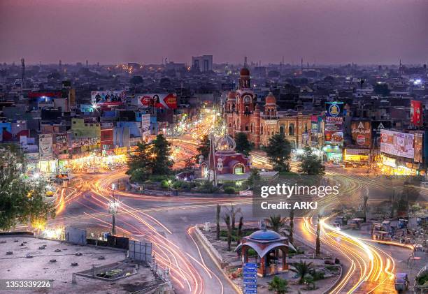 clock tower chowk, multan at night - pakistan skyline stock pictures, royalty-free photos & images