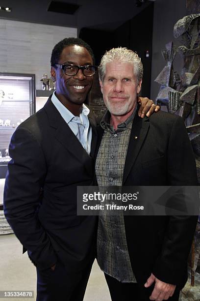 Actors Isaiah Washington and Ron Perlman attend the Opal Stone Luxury Handbags And Fine Jewelry Launch at Gray Gallery on December 8, 2011 in Beverly...