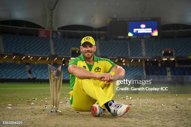 Australia captain Aaron Finch poses with the ICC T20 World Cup after the ICC Men's T20 World Cup final match between New Zealand and Australia at...