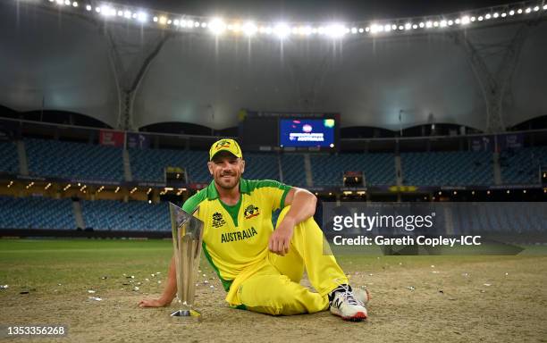 Australia captain Aaron Finch poses with the ICC T20 World Cup after the ICC Men's T20 World Cup final match between New Zealand and Australia at...