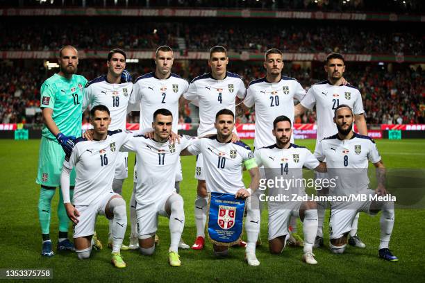 Serbia football team pose for a team photo before the 2022 FIFA World Cup Qualifier match between Portugal and Serbia at Estadio Jose Alvalade on...