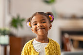 Cute little african american girl looking at camera