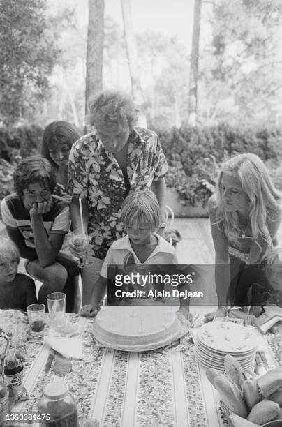 Sylvie Vartan and Johnny Hallyday celebrating their son David's 9th birthday, Biarritz, France 14th August 1975