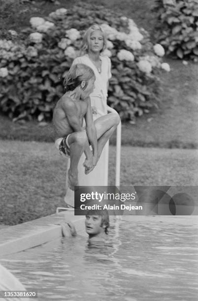 Sylvie Vartan, Johnny Hallyday and their son David in Biarritz, France, August 15, 1975. .