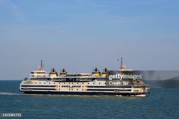 ferry between den helder and texel sailing on the open sea - den helder stock pictures, royalty-free photos & images