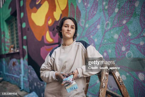 cute female street artist - graffiti artists stock pictures, royalty-free photos & images