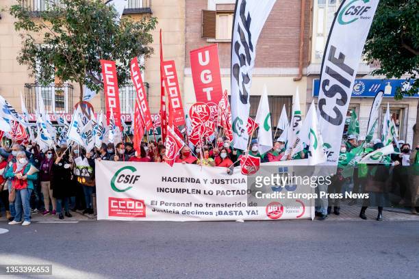 Group of people concentrates with banners and flags in front of the Ministry of Justice before the "blocking" of the salary increase for the staff of...