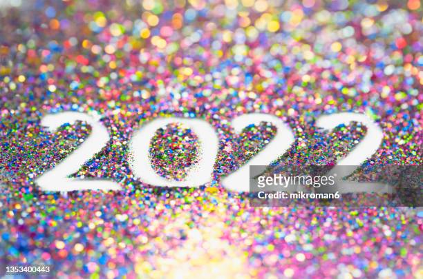 2022 happy new year background multicoloured  glitter - 2017 2022 stock pictures, royalty-free photos & images