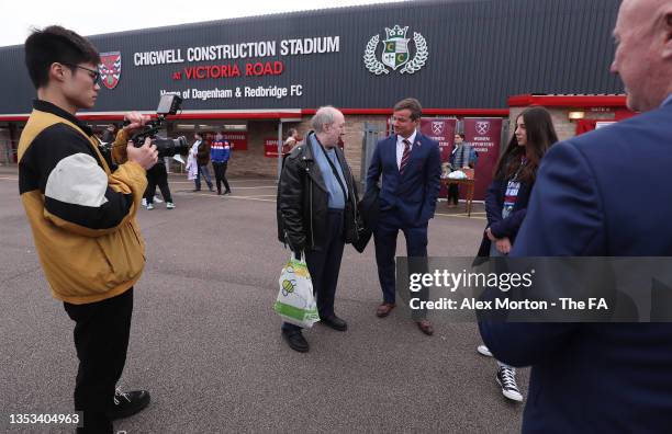 Former West Ham player Stuart Slater speaks to fans outside the stadium prior to the Barclays FA Women's Super League match between West Ham United...