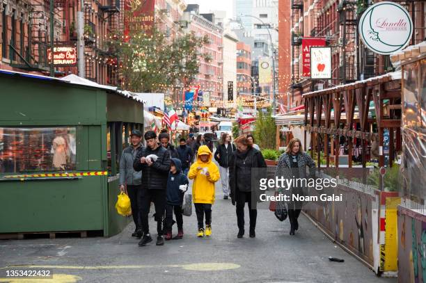 People visit Little Italy on November 14, 2021 in New York City.