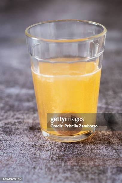 effervescent vitamin c tablet - dissolving stock pictures, royalty-free photos & images