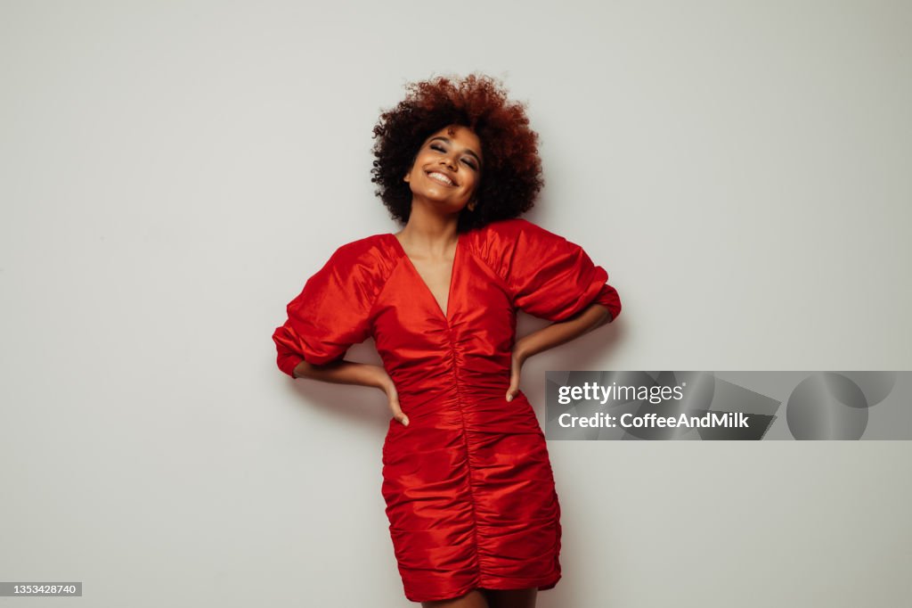 Beautiful smiling girl with curly hairstyle