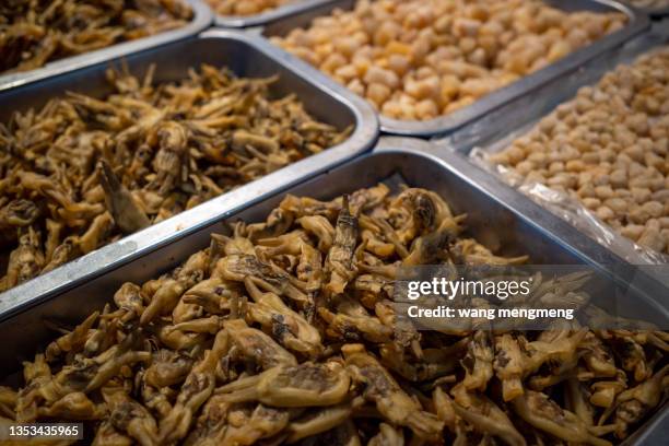 dried seafood sold in the market - sunomono stock pictures, royalty-free photos & images