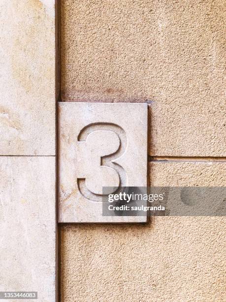 number 3 engraved in stone - house number stock pictures, royalty-free photos & images