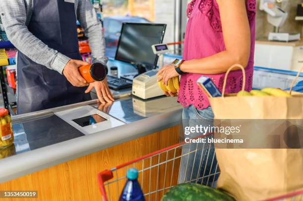 Checking Mobile In Shop Mobile Payment Grocery Store Photos and Premium High Res Pictures ...