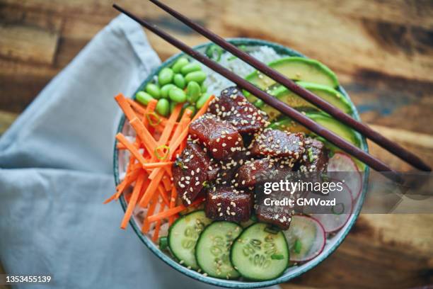ahi tuna with cucumber, radish, carrots and avocado - raw tuna steak stock pictures, royalty-free photos & images