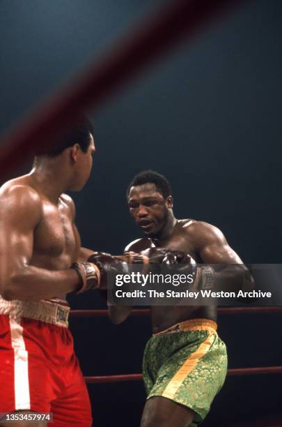 Boxing: WBC/ WBA World Heavyweight Title: Muhammad Ali and Joe Frazier exchange blows, during their bout at Madison Square Garden. New York, New...