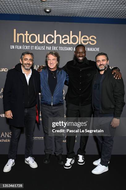 Eric Toledano, François Cluzet, Omar Sy and Olivier Nakache attend the 10th Anniversary of the film "Intouchables" at UGC Normandie on November 15,...