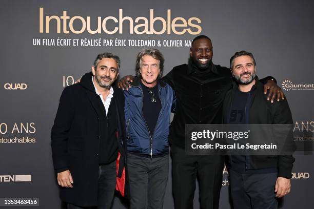 Eric Toledano, François Cluzet, Omar Sy and Olivier Nakache attend the 10th Anniversary of the film "Intouchables" at UGC Normandie on November 15,...