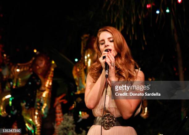Singer Lana Del Rey performs during the Mulberry SS12 Dinner at Chateau Marmont on December 8, 2011 in Los Angeles, California.