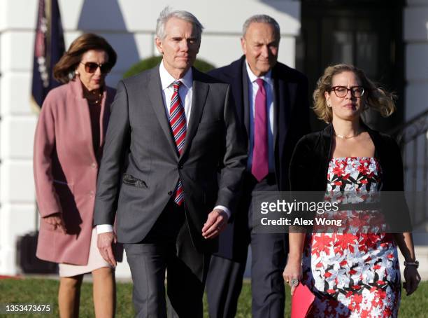 Sen. Kyrsten Sinema , Senate Majority Leader Charles Schumer , Sen. Rob Portman and Speaker of the House Nancy Pelosi arrive for President Joe...