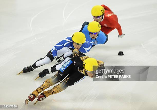 Takamido Yuzo of Japan leads Maxime Chataignier of France, Jordan Malone of the US and Barton Lui of Hong Kong in the heats of the men's 1000m at the...