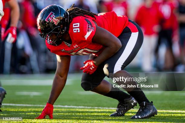 Defensive lineman Devin Drew of the Texas Tech Red Raiders lines up during the second half of the college football game against the Iowa State...