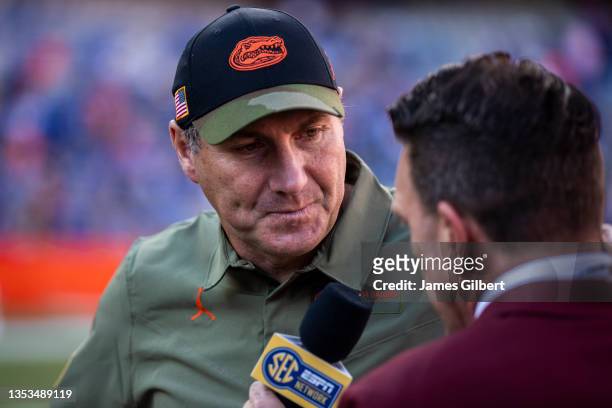 Head coach Dan Mullen of the Florida Gators is interviewed by ESPN after defeating the Samford Bulldogs 70-52 in a game at Ben Hill Griffin Stadium...