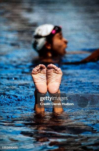 Close-up of the feet of an unidentified competitor during a Synchronized Swimming event at the 1992 Summer Olympics, Barcelona, Spain, between July...