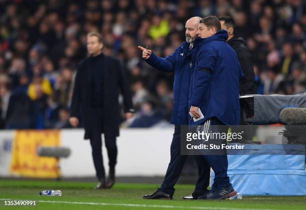 Steve Clarke, Head Coach of Scotland speaks to John Carver, Assistant manager of Scotland during the 2022 FIFA World Cup Qualifier match between...