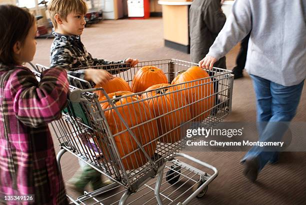 cart full of pumpkins - young cheyenne stock pictures, royalty-free photos & images