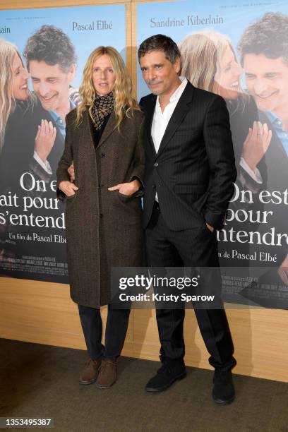 Sandrine Kiberlain and Pascal Elbe attend the "On Est Fait Pour S'Entendre" premiere at Cinema Pathe Wepler on November 15, 2021 in Paris, France.