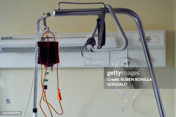 blood transfusion at room hospital - blood bag stock pictures, royalty-free photos & images