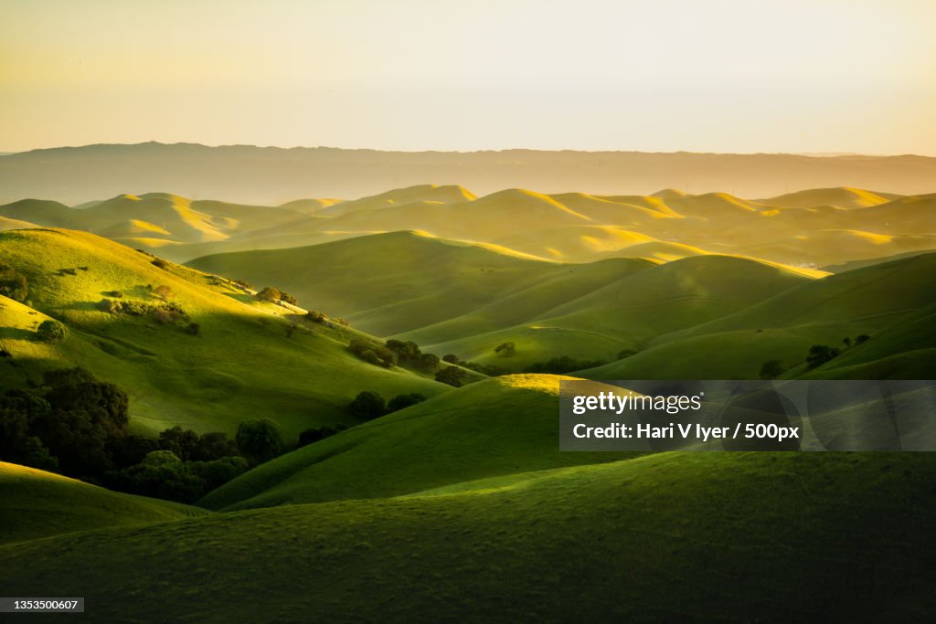 Scenic view of landscape against sky during sunset