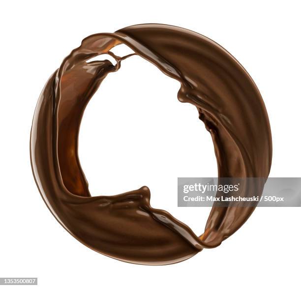 close-up of chocolate donut over white background - syrup splash stock pictures, royalty-free photos & images