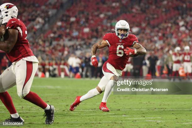 Running back James Conner of the Arizona Cardinals scores on a 11-yard rushing touchdown against the Carolina Panthers during the fourth quarter of...