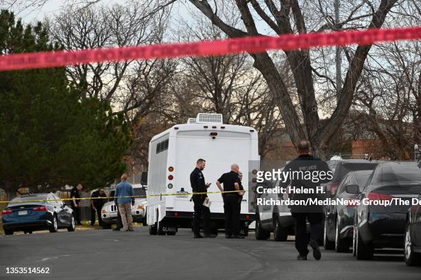 Aurora Police officers investigate the scene of an early afternoon shooting at Nome Park near Aurora Central High School on November 15, 2021 in...