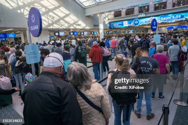 busy orlando airport in november 2021 - busy airport stock pictures, royalty-free photos & images