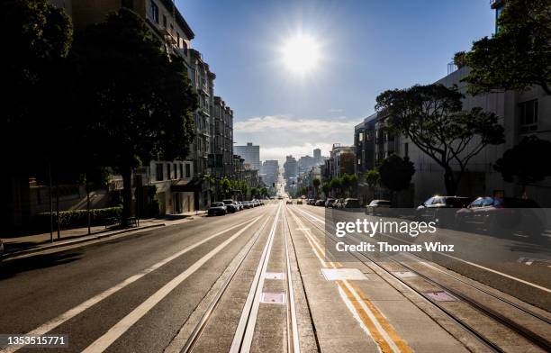 straight city street in bright sunlight - nob hill stock pictures, royalty-free photos & images