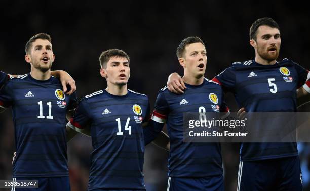 Scotland players left to right Ryan Christie, Billy Gilmour, Callum McGregor and John Souttar sing the national anthem during the 2022 FIFA World Cup...