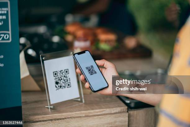 payment for paying by smartphone - nfc technology - food truck payments stock pictures, royalty-free photos & images