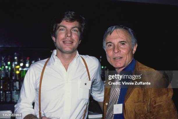 American actor Peter Bergman, wearing a white shirt with tan braces, and American actor and dancer James Mitchell , wearing a tan suede jacket over a...