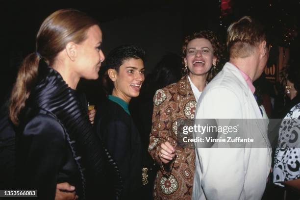 American club owner Ingrid Casares and American actress and comedian Sandra Bernhard with people attending the 'Terminator 2: Judgment Day' premiere...