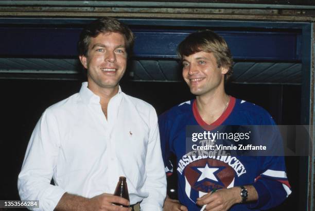 American actor Peter Bergman, wearing a white shirt which is open at the collar, and American actor Michael Tylo , wearing a blue top with 'The...