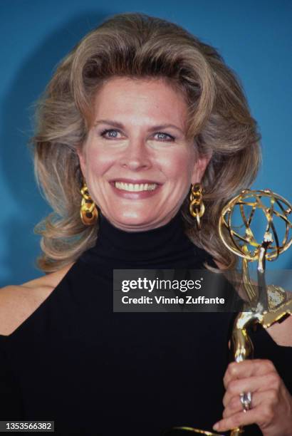 American actress Candice Bergen, wearing a high-neck black outfit with exposed shoulders, in the press room of the 44th Primetime Emmy Awards, held...