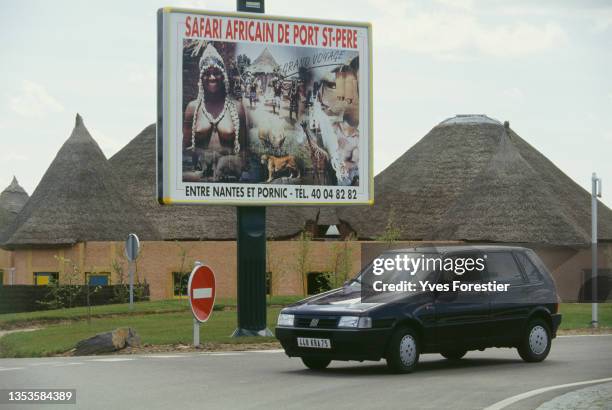 Advertising poster of the Safari Park that was called 'Le Village de Bamboula' located at the Planète Sauvage zoological park in Port Saint-Père,...