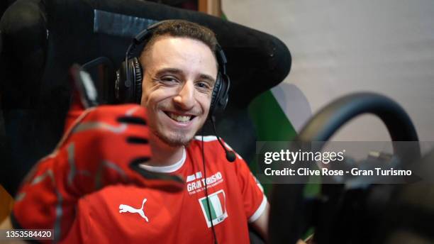 Valerio Gallo of Italy celebrates victory in the Nations Cup race during round 4 of the Gran Turismo World Series 2021 run at the virtual Fuji...