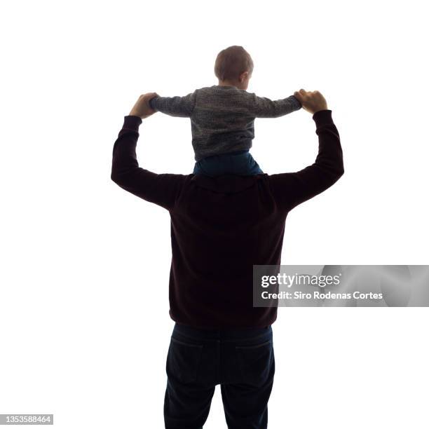 father and son silhouette - children playing silhouette stock pictures, royalty-free photos & images